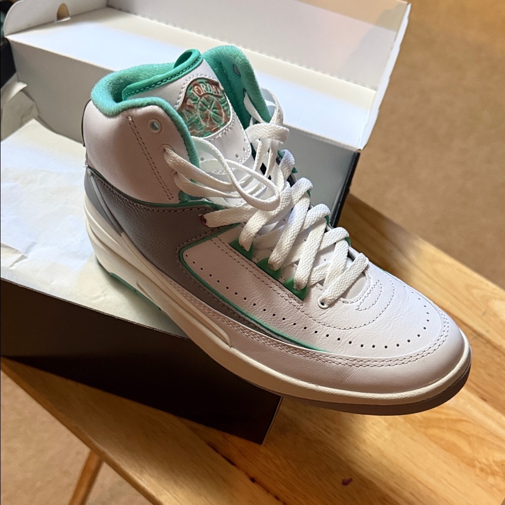Jordan Women’s High-Top Sneakers in White and Teal